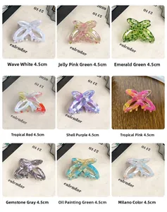 Detail showing nine colorful 4.5cm acetate butterfly hair claws with marble texture