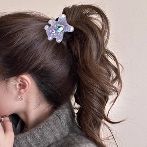 Cute Korean style purple checkered bear hair tie with heart gem on curly hair