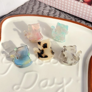 5-piece set of small cute acetate cat hair claw clips in assorted marble patterns and colors