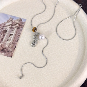 Silver snake chain necklace with tiger eye stone and pearl grape-shaped tassel pendant