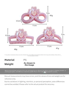 Détails de grandes pinces à cheveux à fleurs rose nacré montrant les dimensions de 11 cm