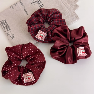 Three-piece hair scrunchie set in vintage red plaid, polka dots and satin fabric styles