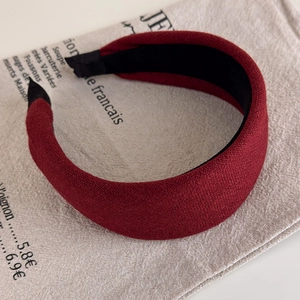 Detail view of burgundy retro plaid wide headband with soft fabric texture and inner padding