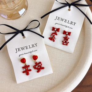 Boucles d'oreilles festives rouges du Nouvel An avec caractères chinois Pingan et Xile
