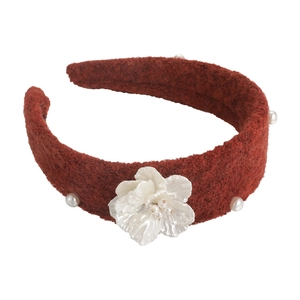 Elegant red tweed headband with white camellia flower and pearls for a vintage look