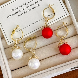 Festive Chinese New Year long pearl drop earrings with red matte beads and gold accents