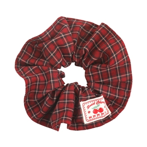 Vintage red plaid scrunchie with sweet cherry fabric label for elegant hair styling