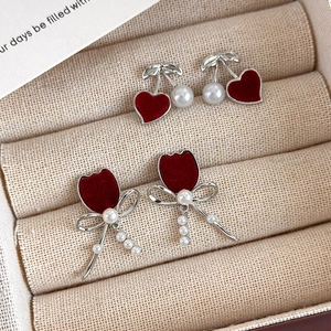 Elegant red velvet cherry and tulip bow earrings with pearls for a vintage winter style