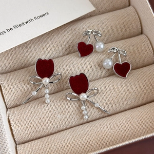 Elegant red flocked heart and tulip bow earrings set with pearls and silver details