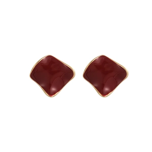 Minimalist square wine red enamel stud earrings with golden wavy edges on white background
