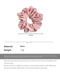 Pink satin scrunchie detail showing 12cm diameter and 19g weight on white background