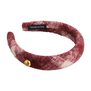 Thick red and cream plaid headband with gold bow buckle and sparkly metallic thread