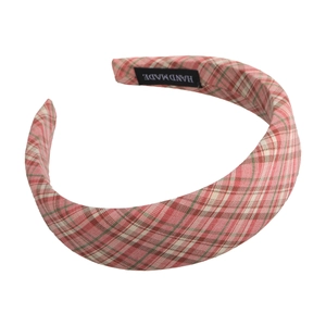 Pink plaid padded headband with handmade woven label for elegant high-top hair styling