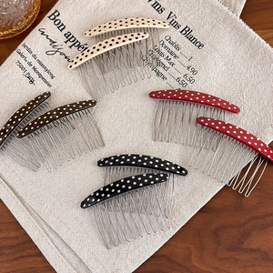 Vintage polka dot acetate curved hair combs in various colors with metallic teeth