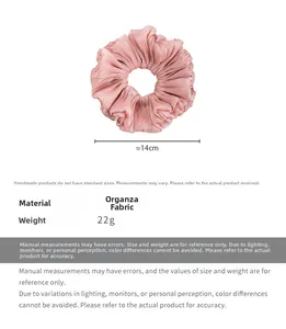 Pink large organza scrunchie detail showing 14cm diameter size and glossy pleated texture