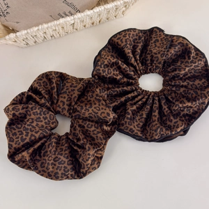 Two-piece set of leopard print velvet hair scrunchies in brown and black tones