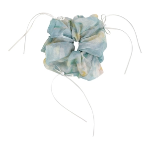 Detail of blue floral oil painting hair scrunchie with white ribbons and pearls