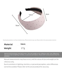 Detailed size parameters of the pink polka dot wide headband showing 14cm inner diameter