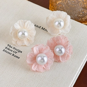 Romantic chiffon flower stud earrings with central pearls in cream and soft pink colors