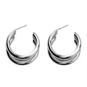Polished silver double-layered C-shaped metal hoop earrings with a modern minimalist style
