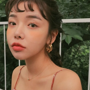 Fashionable golden geometric hoop earrings and minimalist bead necklace for women