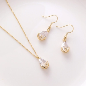 Elegant gold flower hollow set with teardrop zircon pendant necklace and hook earrings