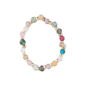Detail view of colorful faceted crystal beads and golden metallic spacer beads