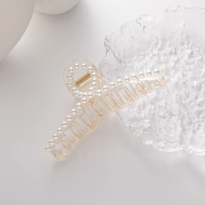 Eleganter bernsteinfarbener transparenter Haarklammer mit weißen Perlen für Damen