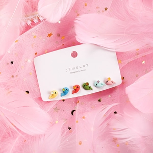 Set of 6 pairs of colorful cartoon whale stud earrings with floral accents and 925 silver pins