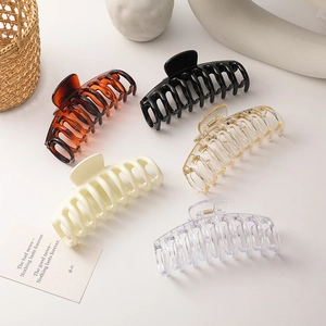 Elegant large shark hair clips in five colors including amber and black for thick hair