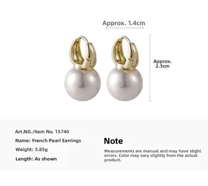 Detailed view of French pearl hoop earrings with size specs 1.4cm width and 2.5cm height