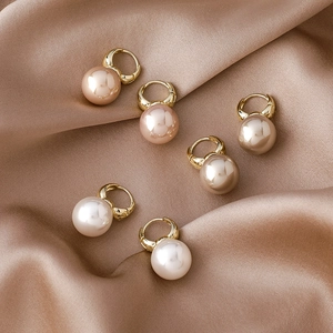 Luxury pearl hoop earrings in pink, champagne, and cream with gold metal buckles