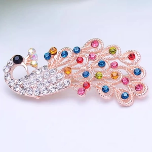 Elegant Chinese style peacock brooch with colorful crystals and rhinestones on rose gold