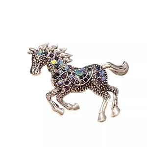 Vintage horse brooch with colorful crystals and retro silver plating for luxury fashion outfits