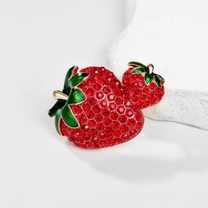 Exquisite double strawberry brooch with sparkling red rhinestones and green enamel leaf