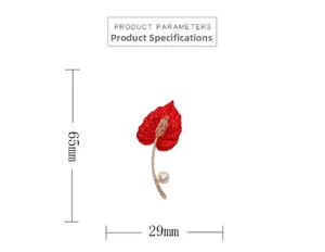 Detailed view of red leaf brooch with pearls and zircon showing 65mm x 29mm size dimensions