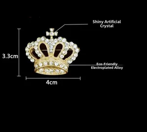 Detail view of 4cm gold crown brooch with shining artificial crystal and alloy plating