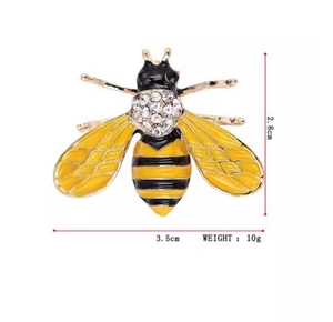 Macro detail of diamond bee brooch showing dimensions 3.5cm x 2.8cm and 10g weight