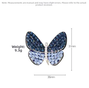 Detail view of crystal butterfly brooch showing dimensions 36mm by 31mm and 9.3g weight