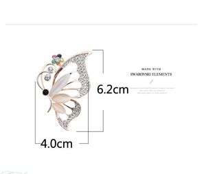 Detail view of butterfly brooch with white opal wings and sparkling crystals, 6.2cm size