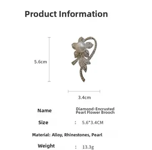 Detailed view of silver flower brooch with crystal petals and pearl center, size 5.6x3.4cm