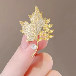 Elegant yellow crystal maple leaf brooch with pearls and white zircons for women