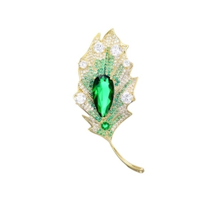 Elegant gold leaf brooch with green crystals and pear-shaped emerald drop for suits