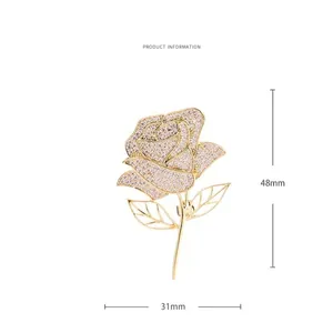 Elegant rose brooch with sparkling zircons in gold plating, 48mm by 31mm size