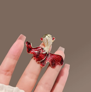 Exquisite gold goldfish brooch with red enamel and sparkling cubic zirconia crystals