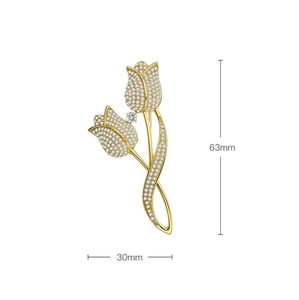 Vue détaillée de la broche tulipe avec cristaux blancs et dimensions 63mm sur 30mm