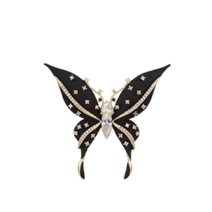 Elegant black butterfly brooch with crystals and gold accents for women's suits
