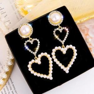 Elegant 925 silver needle drop earrings with triple heart faux pearls and rhinestones