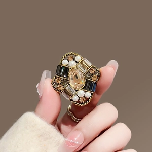Vintage gold champagne crystal brooch with pearls and black stones in retro style