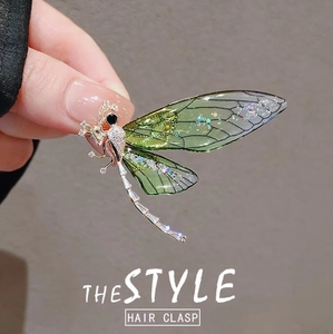 Elegant green dragonfly hair clasp with translucent wings and white zircon stones